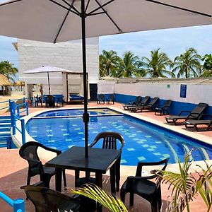 Cabanas Familiares En Covenas Con Piscina Frente A La Playa Nicomar Exterior photo